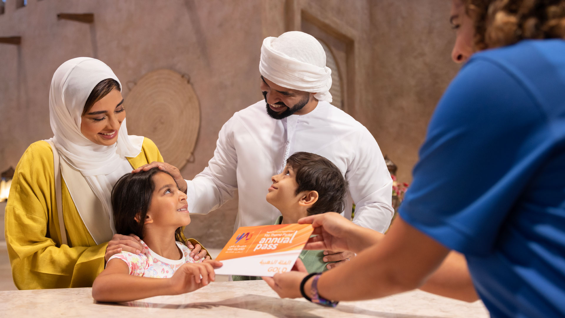 An Emirati Family with 2 children buying an Annual Pass