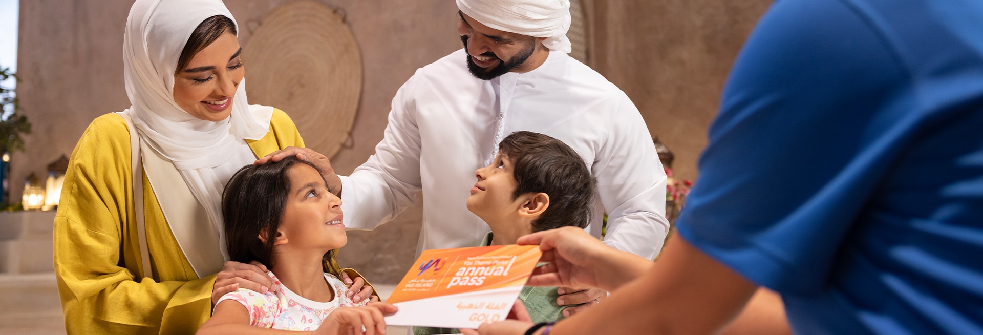 Emirati family buying Annual Pass