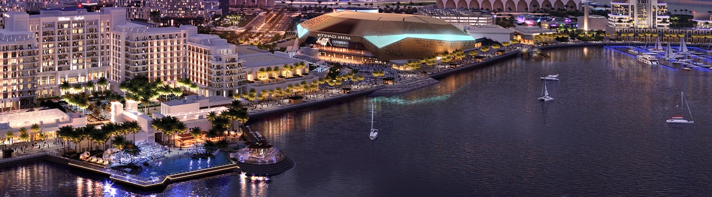 Image of Yas Bay and the Arena at night.