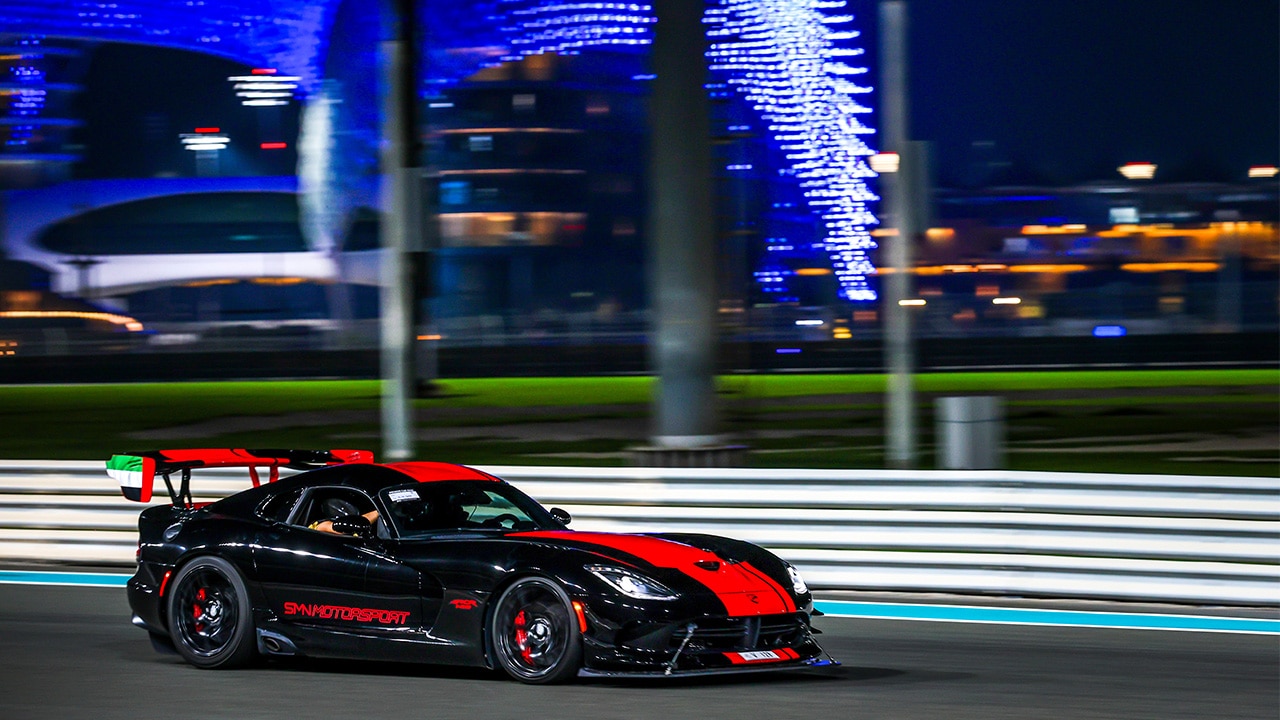 Premium sports cars racing at Yas Marina Circuit