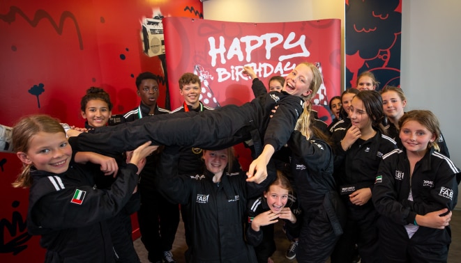 Team celebrating birthday at Yas Marina Circuit Kartzone