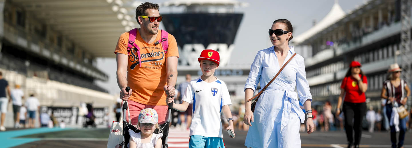 Family walking along the Formula 1 Abu Dhabi Grand Prix track