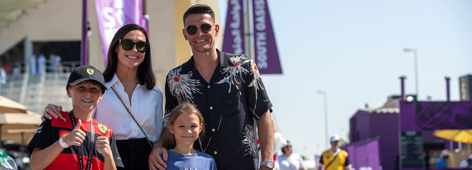 Family walking along the Formula 1 Abu Dhabi Grand Prix track