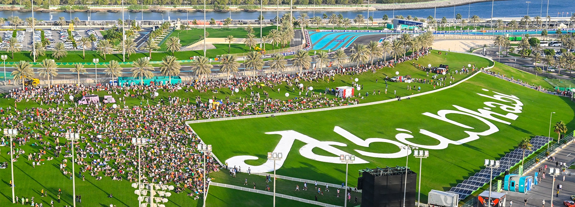 View of car racing past from Abu Dhabi Hill during the F1 Abu Dhabi Grand Prix. 