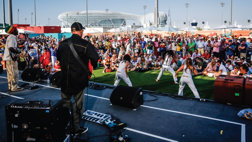 Band playing for crowds at Yas Marina Circuit during F1